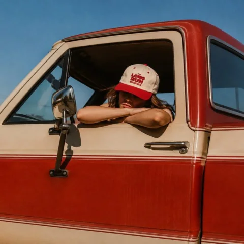 Vintage truck and red-brim Long Run cap